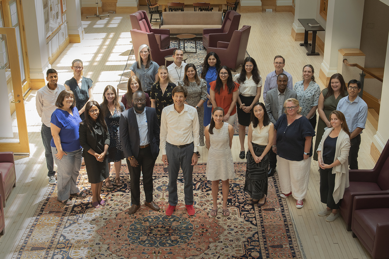 Staff from the Center for Integration Science in global health equity gathered in November 2022 to celebrate the center’s launch during an inaugural symposium. Dr. Gene Bukhman is center front.